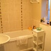 Photo 3: Shared bathroom. also has separate shower cubicle