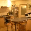 Photo 2: Shared kitchen. Also a utility room off the back with washing machine and separate toilet