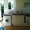 Photo 7: Kitchen and backdoor down to garden