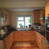 Photo 3: New and spacious kitchen with access to the private garden 