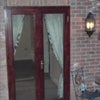 Photo 2: Glazed double French doors ensure a light bright entrance