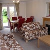 Photo 3: Large TV / Dining Lounge