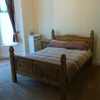 Photo 2: Bedroom - Corona Pine Bed