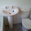 Photo 3: Bathroom with shower over the bath
