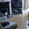 Photo 5: Front Room with Sky