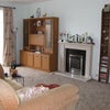 Photo 4: Lounge (which has 2 large sofas in) and large TV