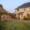 Photo 1: Front of the house and driveway