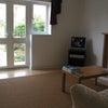 Photo 2: Living room with French doors to garden