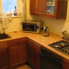 Photo 5: Upstairs kitchen