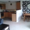 Photo 2: shared lounge/dining/kitchen