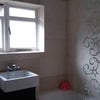 Photo 6:  modern, clean bathroom with shower