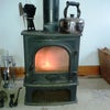 Photo 3: wood burning stove supplements gas central heating