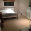 Photo 2: Large double bedroom with built in storage