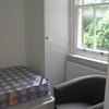 Photo 4: Window and bed