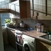 Photo 2: The kitchen - it's bigger than it looks!