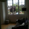 Photo 3: The shared living area - includes a dining table