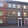 Photo 2: Front of apartments