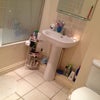Photo 3: Bathroom with bath and power shower