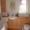 Photo 4: B/Room with power shower and cupboards