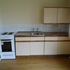 Photo 4: Kitchenette, with 4-hob oven and Washing Machine aside