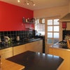 Photo 3: Contemporary kitchen equiped with everything you might need.