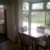 Photo 6: Communal Area with view of Pearson Park