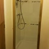 Photo 7: Large shower cubicle with full-width opening glass door
