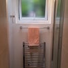 Photo 4: Heated towel rail and radiator in bathroom