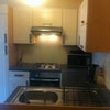 Photo 2: Kitchen area