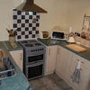 Photo 5: Kitchen area.