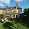 Photo 2: Rear  of the house with enclosed garden