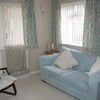 Photo 2: Shared living area