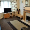 Photo 1: Sitting room