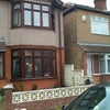 Photo 2: front of house