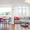 Photo 1: Living/Dining Room