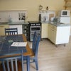 Photo 2: Kitchen/Lounge