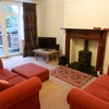 Photo 2: Main living room overlooking garden