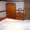 Photo 2: Bedroom, double bed, wardrobe, 2 x chest of drawers
