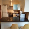 Photo 1: Kitchen, breakfast bar & side view