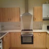Photo 4: Kitchen - complete with all plates etc and appliances