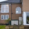 Photo 2: Rear of house. 