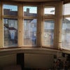 Photo 2: Large bay windows with pinewood blinds