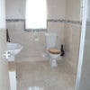 Photo 4: Tiled bathroom with underfloor heating