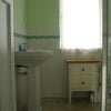 Photo 5: Bathroom has shower & loo