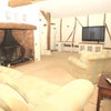 Photo 5: lounge with 75 inch TV