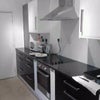 Photo 4: kitchen.newly fitted/appliances.solid pine table/chairs.