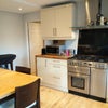 Photo 6: dining table and kitchen