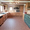 Photo 2: Cook up a storm in the well equipped kitchen!