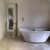 Photo 4: Bathroom with shower and wall hung toilet