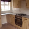 Photo 4: Kitchen diner- new oven, washing machine, fridge freezer.